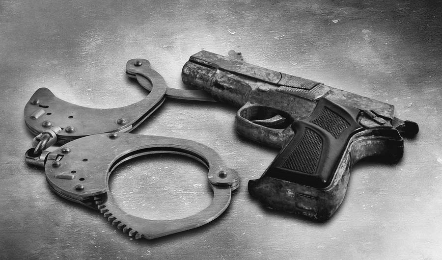 Gun And Handcuffs
